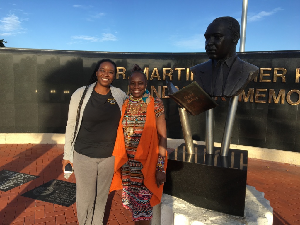 Seminole descendant and keynote speaker Windy Goodloe, from Brackettville, Texas (left), with, FBHRP President Dr. Wallis Tinnie at the Dr. Martin Luther King Jr. Memorial on Flagler Drive near downtown West Palm Beach.  